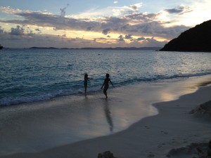 the kids play in the water way past dusk