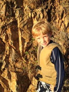 Porter looking at the rocks on our hike