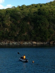 Reese kayaking in our secluded harbor