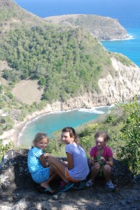 The girls rest on the way up.