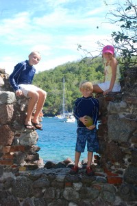 The kids sit on the pottery ruins with Patronus in the background.