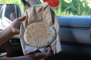 We were starting to fade, so Stan stopped to get us some bread, which we think was made with coconut and cassava, but we were delirious with hunger and now none of us remembers.