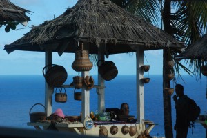 Carib crafts for sale on the side of the road.