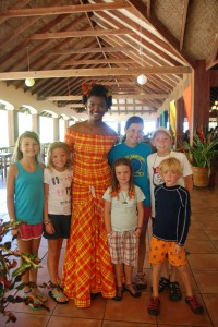 Our hostess greets us in traditional Grenadian dress.