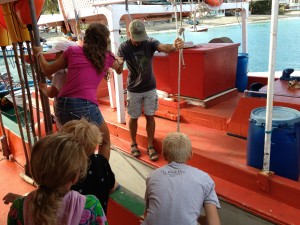 As always, the adventures lies in the journey.  Here we are climbing over two fishing boats (and the men passed out on them) to get to our dinghy.