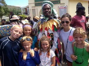 The kids with one of the Shakespeare Mas players