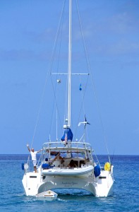 Craig waves "bye bye" as he and Wendy enjoy a double-handed sail