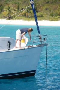 Not to be outdone by a 6 year old, Lana figures out the whole anchoring process over on the charter boat.