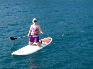 Lana tries paddleboarding.