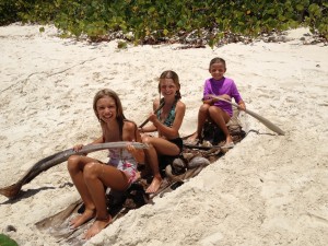 We bump into our friends from s/v Cascadura on Guana Island.  The Island of the Blue Dolphin girls make a canoe, complete with storage and provisions!